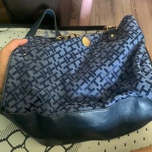 It’s a blue Tommy Hilfiger purse never worn or anything